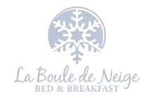 Logo of "La Boule de Neige Bed & Breakfast" featuring a snowflake design.